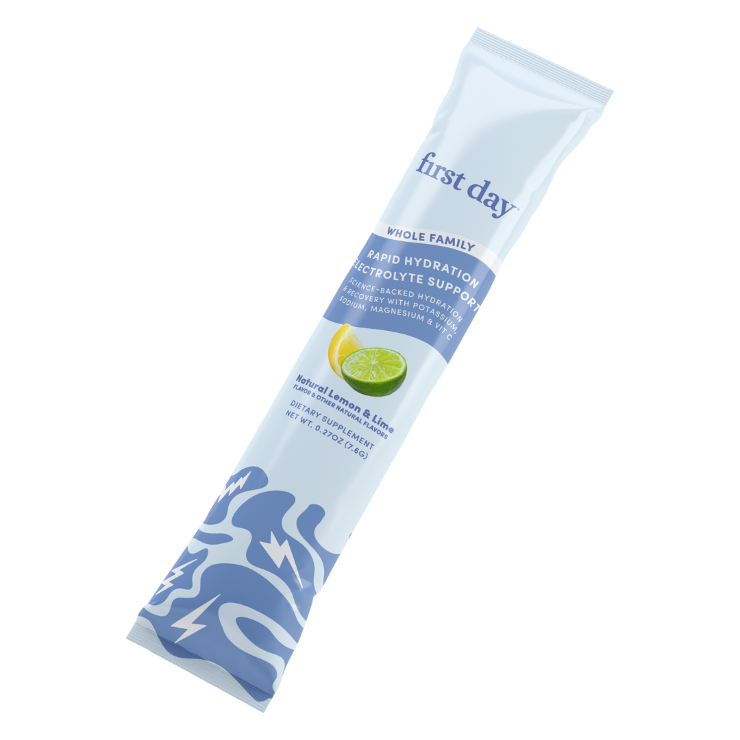 A blue and white stick pack labeled "Rapid Hydration Electrolyte Support - Gift" contains an electrolyte supplement for hydration and muscle recovery in Natural Lemon & Lime flavor, with a lime slice image and abstract blue designs on the packaging.