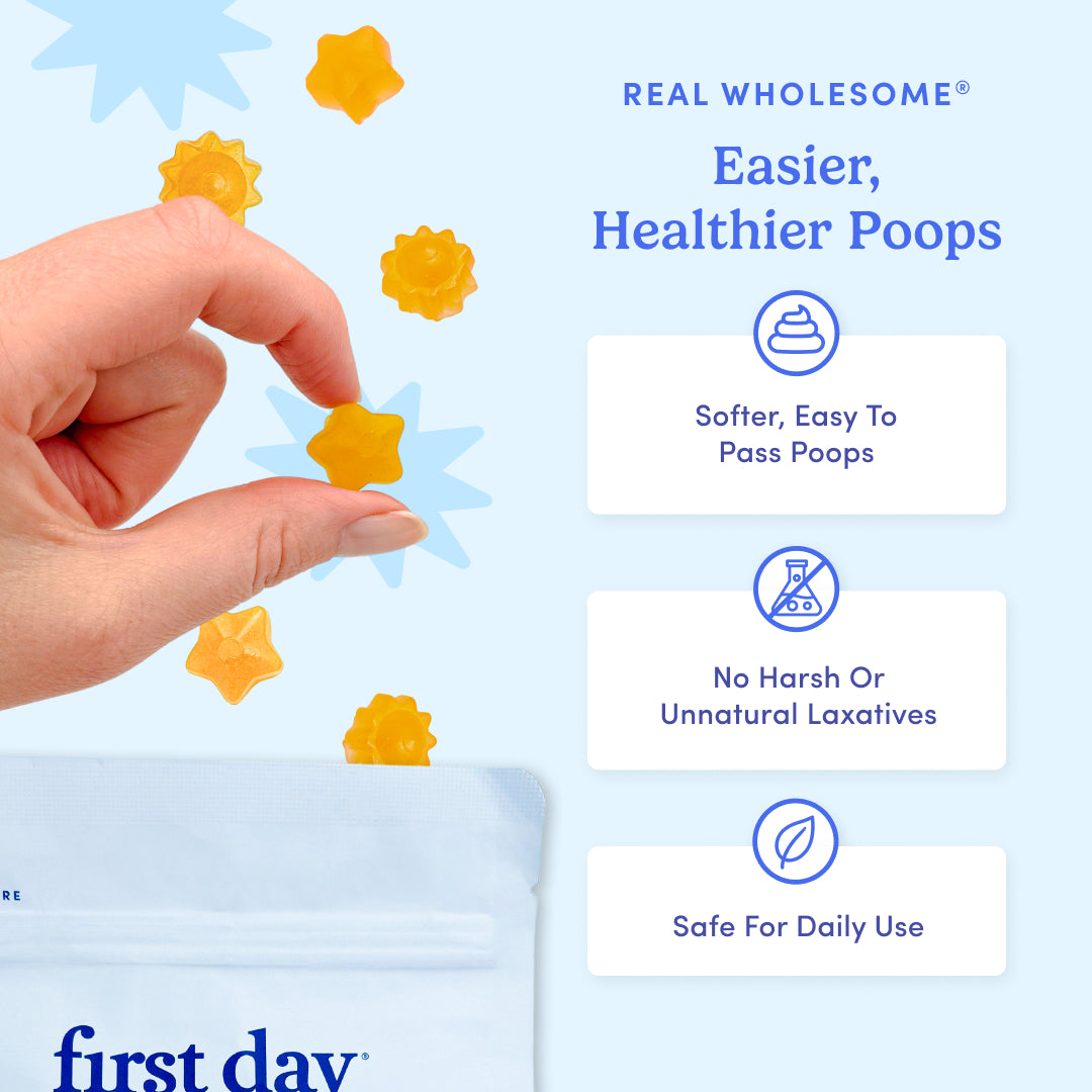 Hand holding a yellow star-shaped product with 'first day' branding on a light blue background.