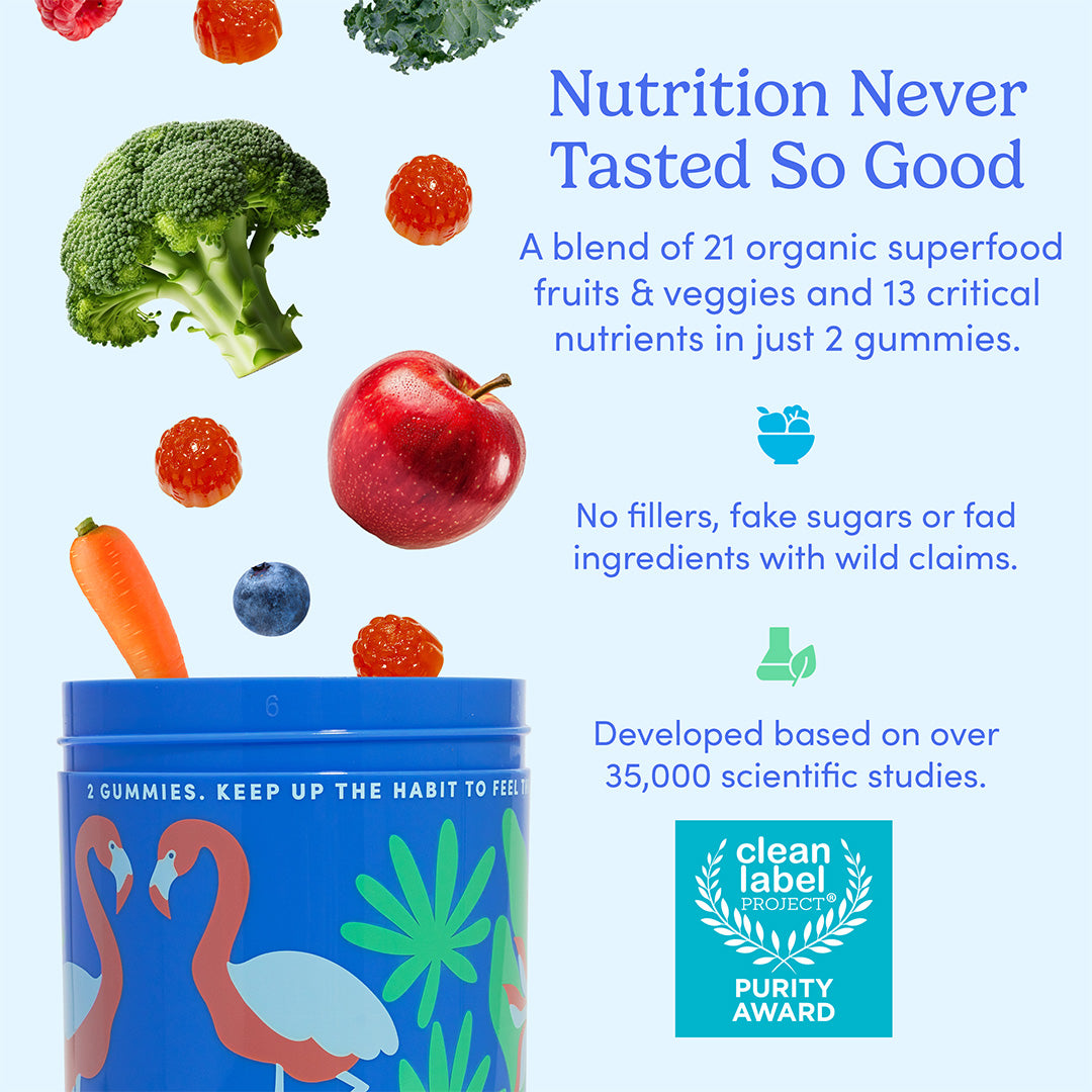 Gummy supplement container with colorful design, surrounded by fruits and vegetables on a light blue background.