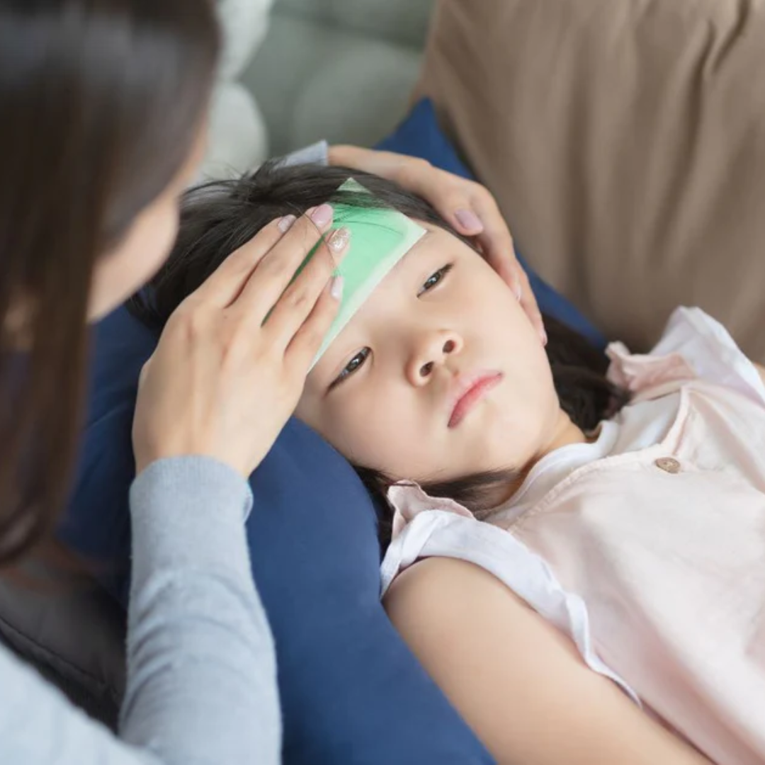 Sick kid being taken care of my parent.