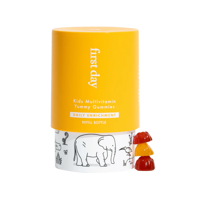 A yellow and white container labeled first day Kids Multivitamin Yummy Gummies stands next to a stack of three colorful gummy vitamins, with animal illustrations on the lower part of the bottle.